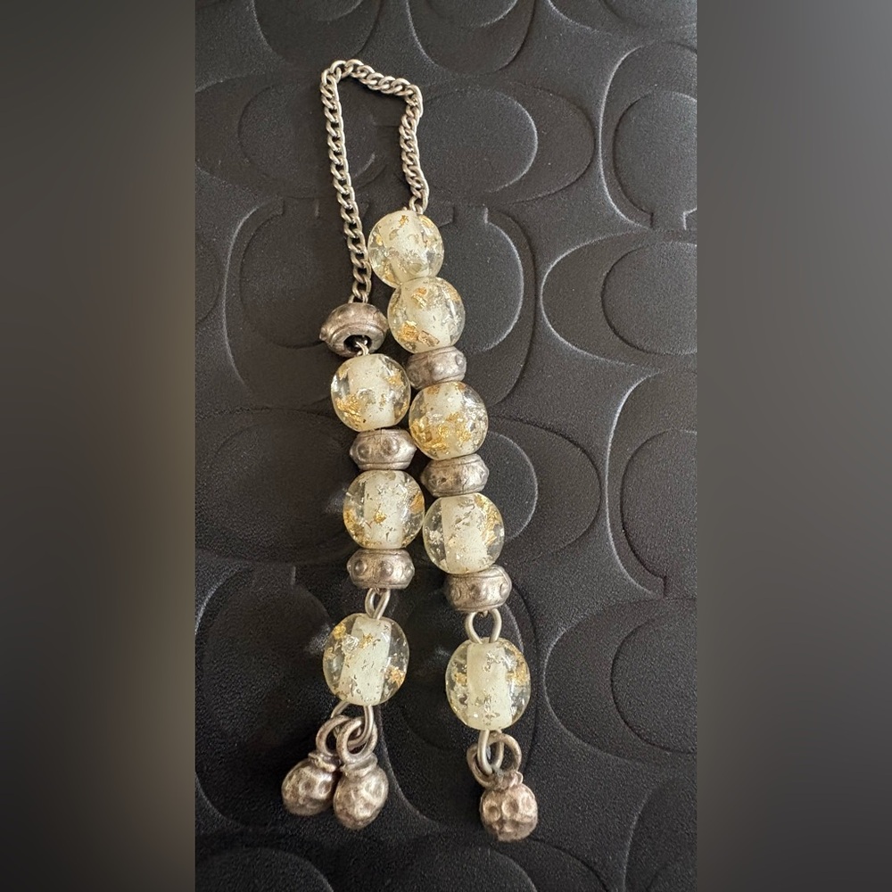 Worry beads, or komboloi, Glass with gold flecks 
and Silver